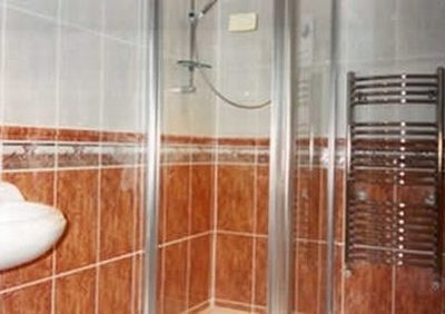 Bathroom or kitchen decorated by Jim'll Paint It